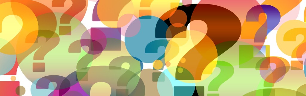 Pictured are layered colorful question marks.